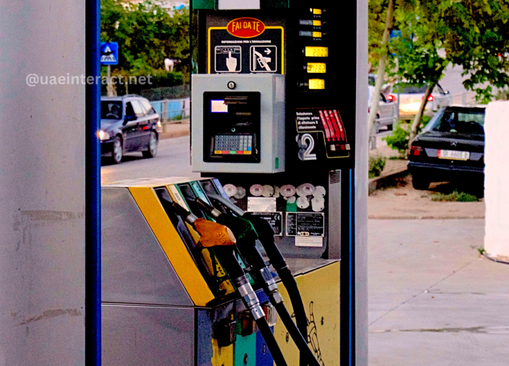 uaeinteractnet - UAE Interact Gas pump with payment terminal and multiple fueling hoses at a street-side fuel dispenser.