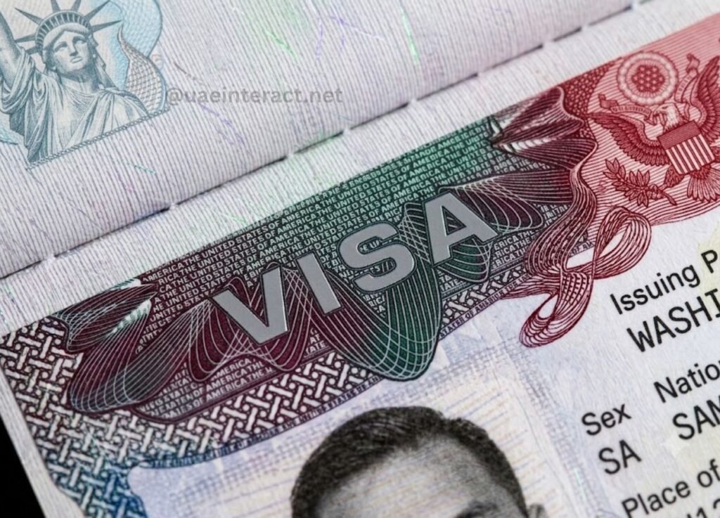 - UAE Interact Close-up of a U.S. visa page with the word VISA and imagery of the Statue of Liberty and eagle.